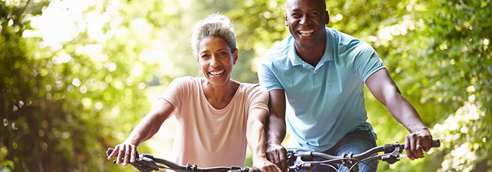 Chiropractic Roseville MN Happy Biking Couple